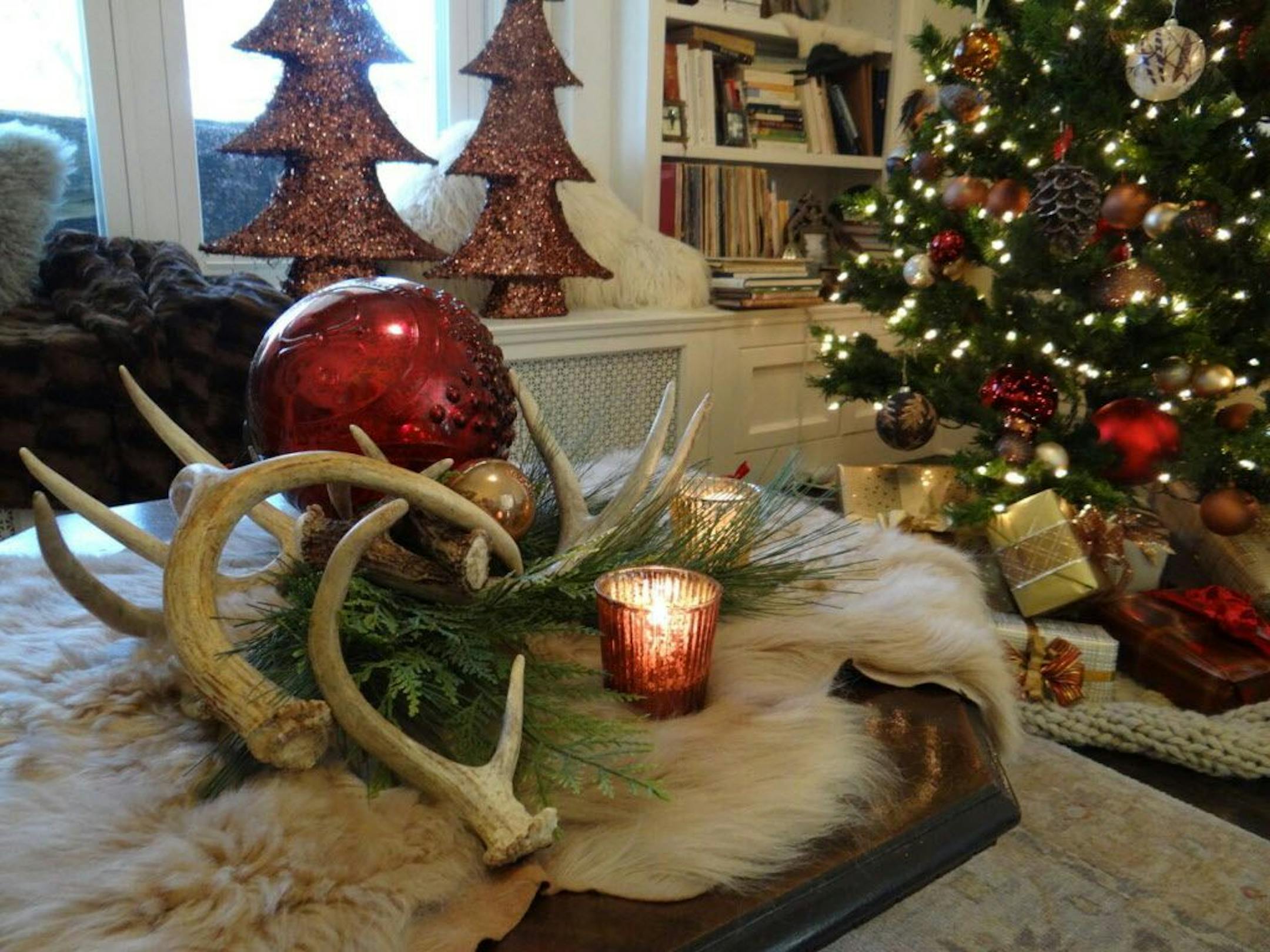 Fur and antlers provide rustic accents.