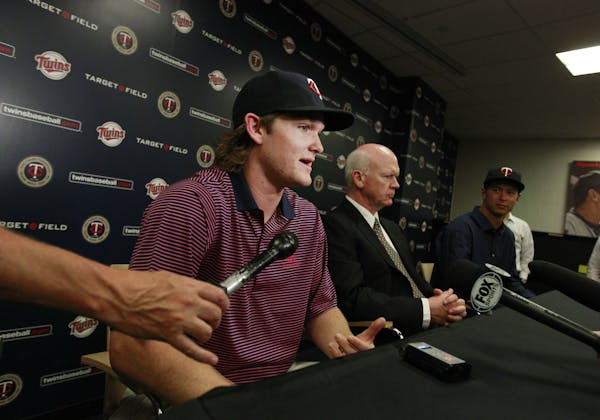 Minnesota Twins first-round draft pick Kohl Stewart, a right-handed pitcher from Houston, Texas, answers questions during a baseball news conference o