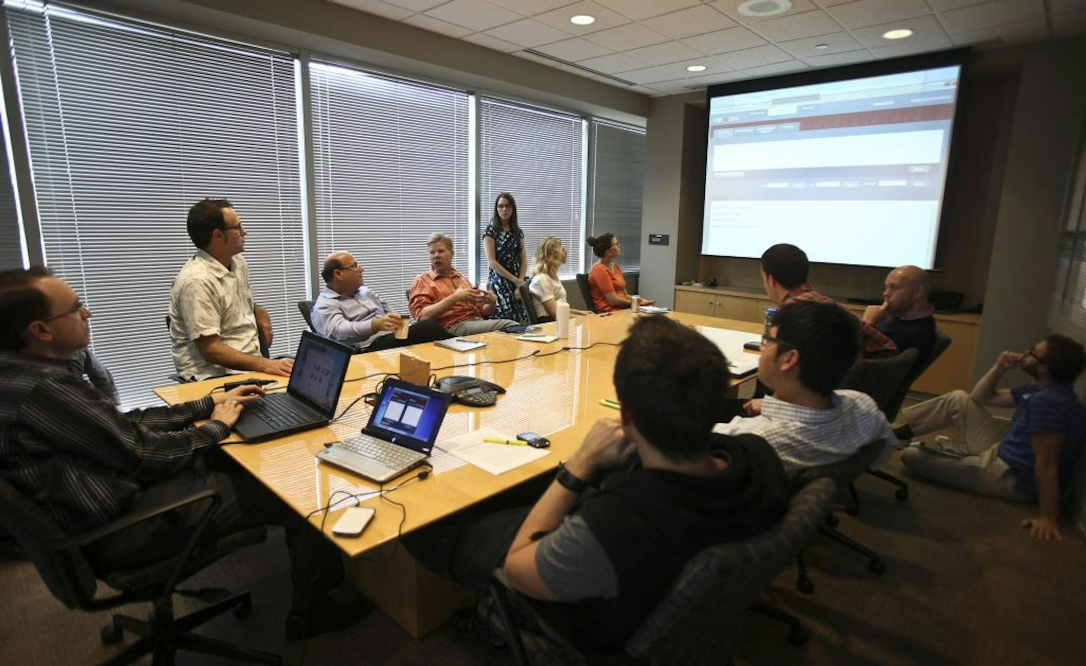 David Krejci, of Weber Shandwick, went over some of the updates to Fire Bell with his a part of his digital team in Bloomington , Minn., Thursday, September 29, 2011.