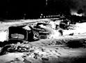 Cars in a ditch after the 1940 Armistice Day blizzard.