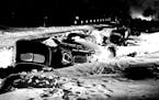 Cars in a ditch after the 1940 Armistice Day blizzard.