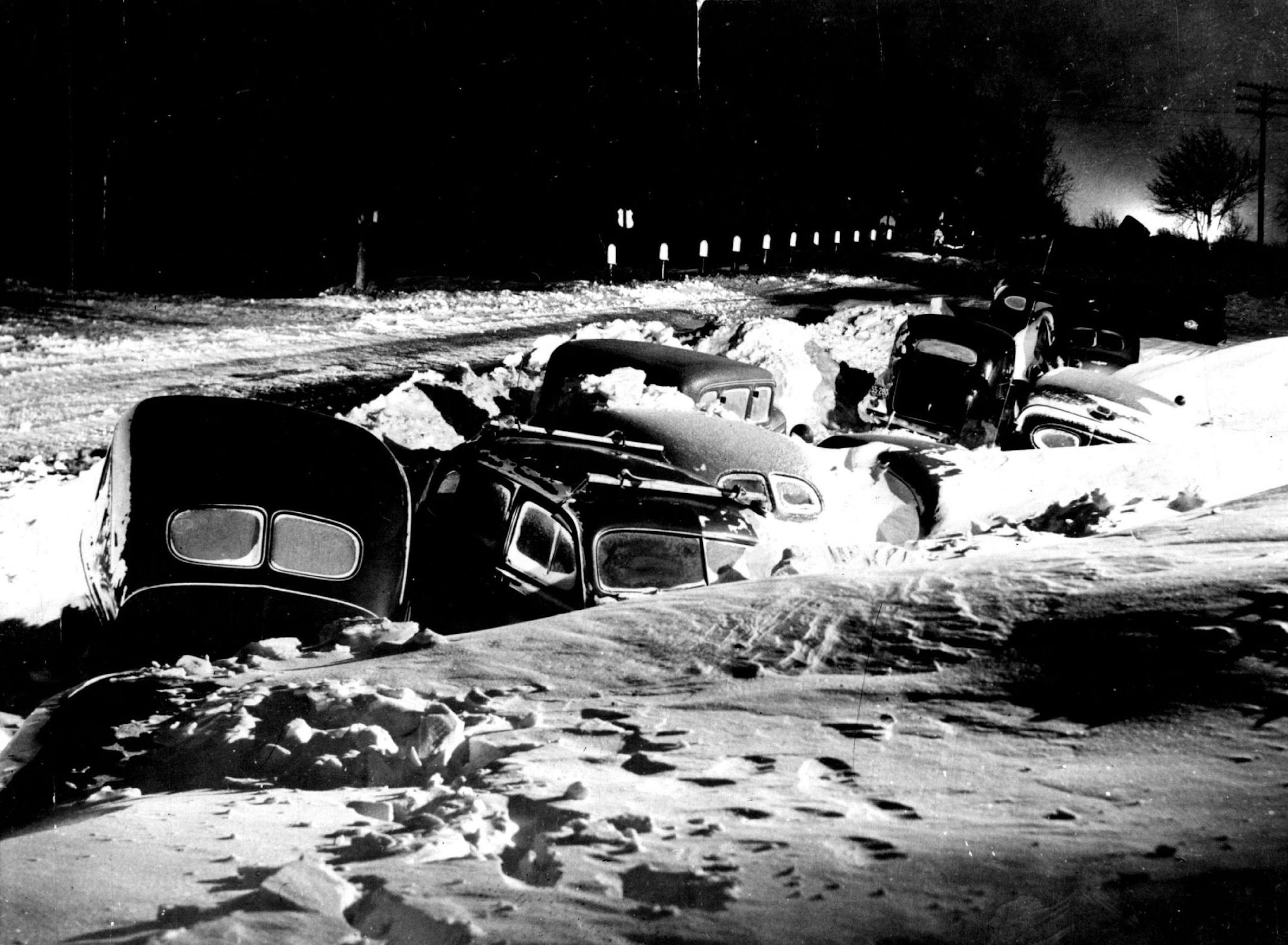Cars in a ditch after the 1940 Armistice Day blizzard.