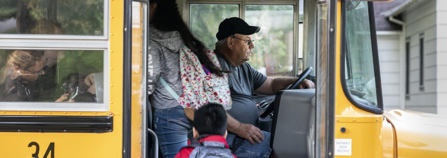 Don Brink picks up students on his route in Worthington, Minn. The town has seen an influx of undocumented children, but Brink does not support a plan to expand local schools. MUST CREDIT: Photo for The Washington Post by Courtney Perry.