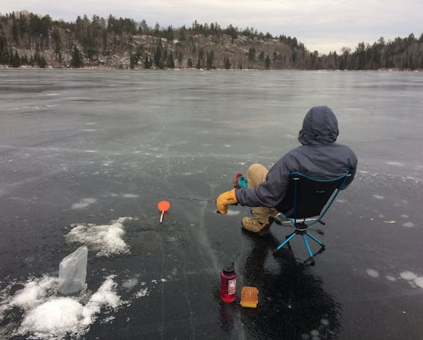 Early season fishing in the Boundary Waters Canoe Area Wilderness can be beautiful but unsettling on new ice.