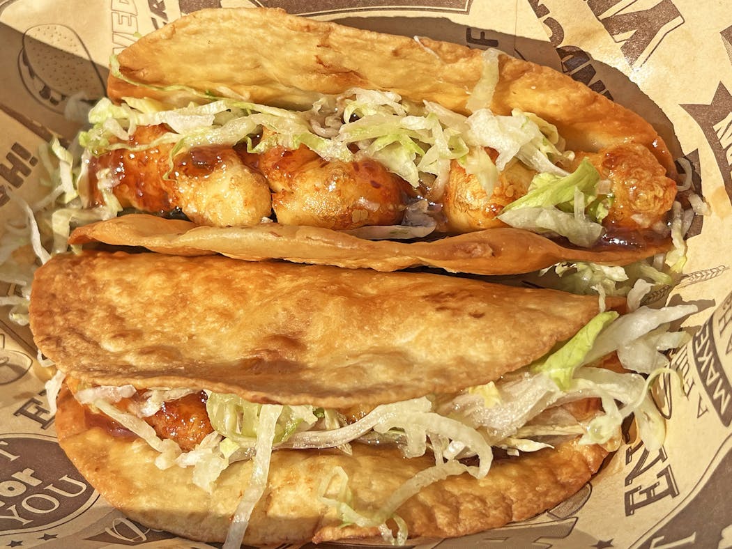 Richie’s Dill Pickle Cheese Curd Tacos combines many of its menu items into one taco.