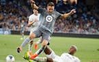 Minnesota United midfielder Ethan Finlay, left, accused MLS owners on Thursday of "bullying" the players into a labor agreement with threats of a lock