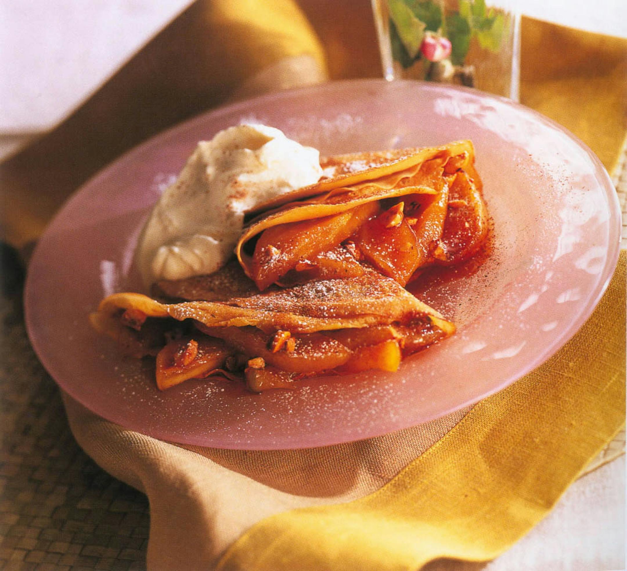 These apple-filled crepes, flavored with cinnamon, sugar and the French apple brandy known as Calvados, look like they'd be a lot of work, but they're really very simple. The pancakes can be made ahead of time, and the fruit sauteed just before serving.