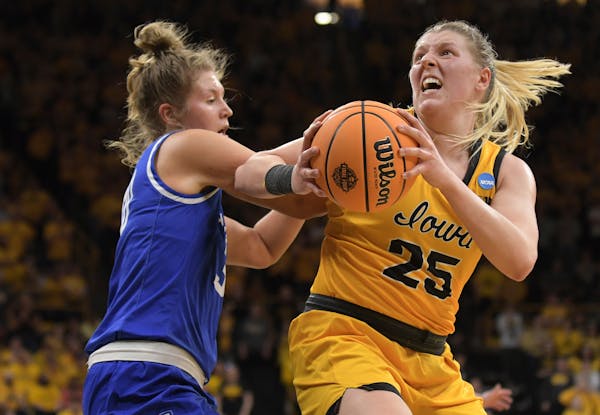 Iowa forward Monika Czinano battled Creighton guard Morgan Maly in last season’s NCAA tournament.