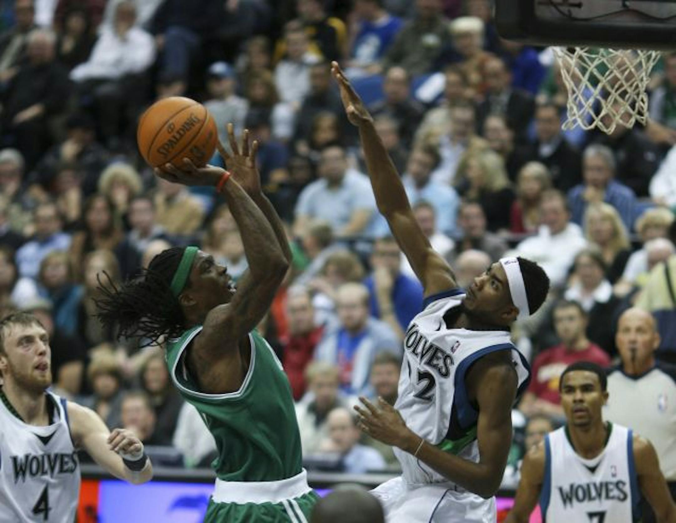 Boston's Marquis Daniels took a shot over the defense of the Timberwolves' Corey Brewer in the second half Wednesday night.