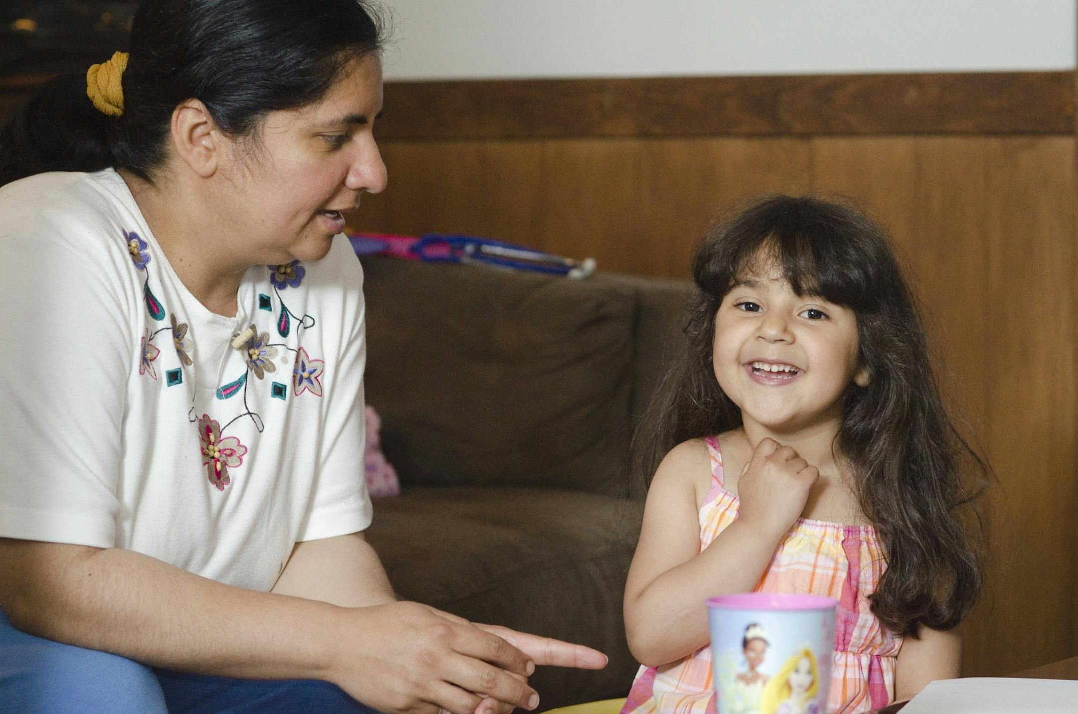 Claudia Irizarry, left, plays with her daughter Angela at their home in Lewisburg, Pa.. Two years ago, Angela needed a crucial blood vessel. Researchers built her one in a laboratory, using cells from her own bone marrow. Today the 5-year-old sings, dances and dreams of becoming a firefighter - and a doctor.