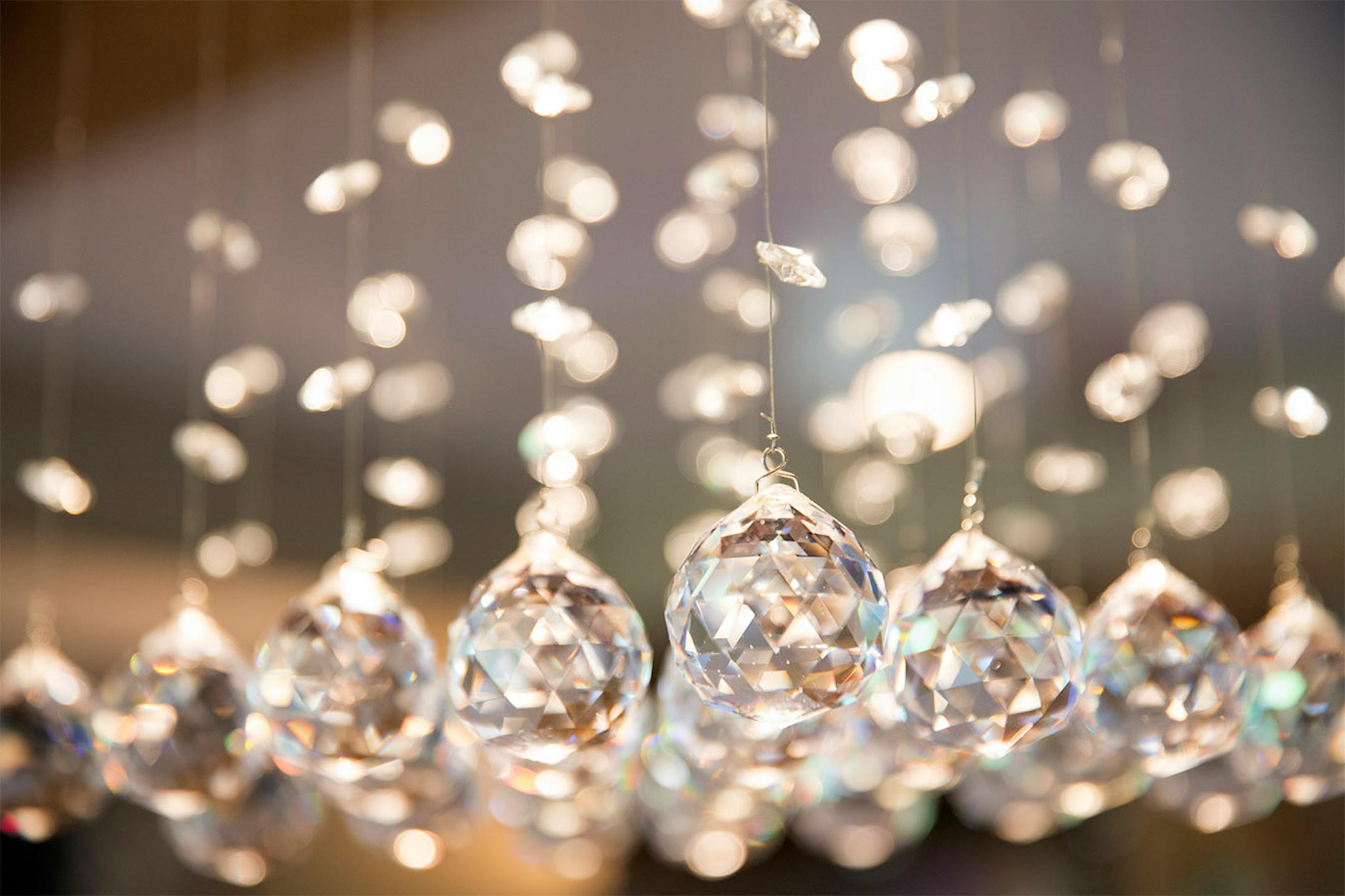 A crystal chandelier above the peninsula adds bling to the kitchen.