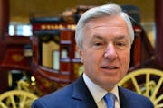 John Stumpf, Wells Fargo CEO, was in Minneapolis for the groundbreaking of the new office project near the Vikings stadium. and posed with the Wells F