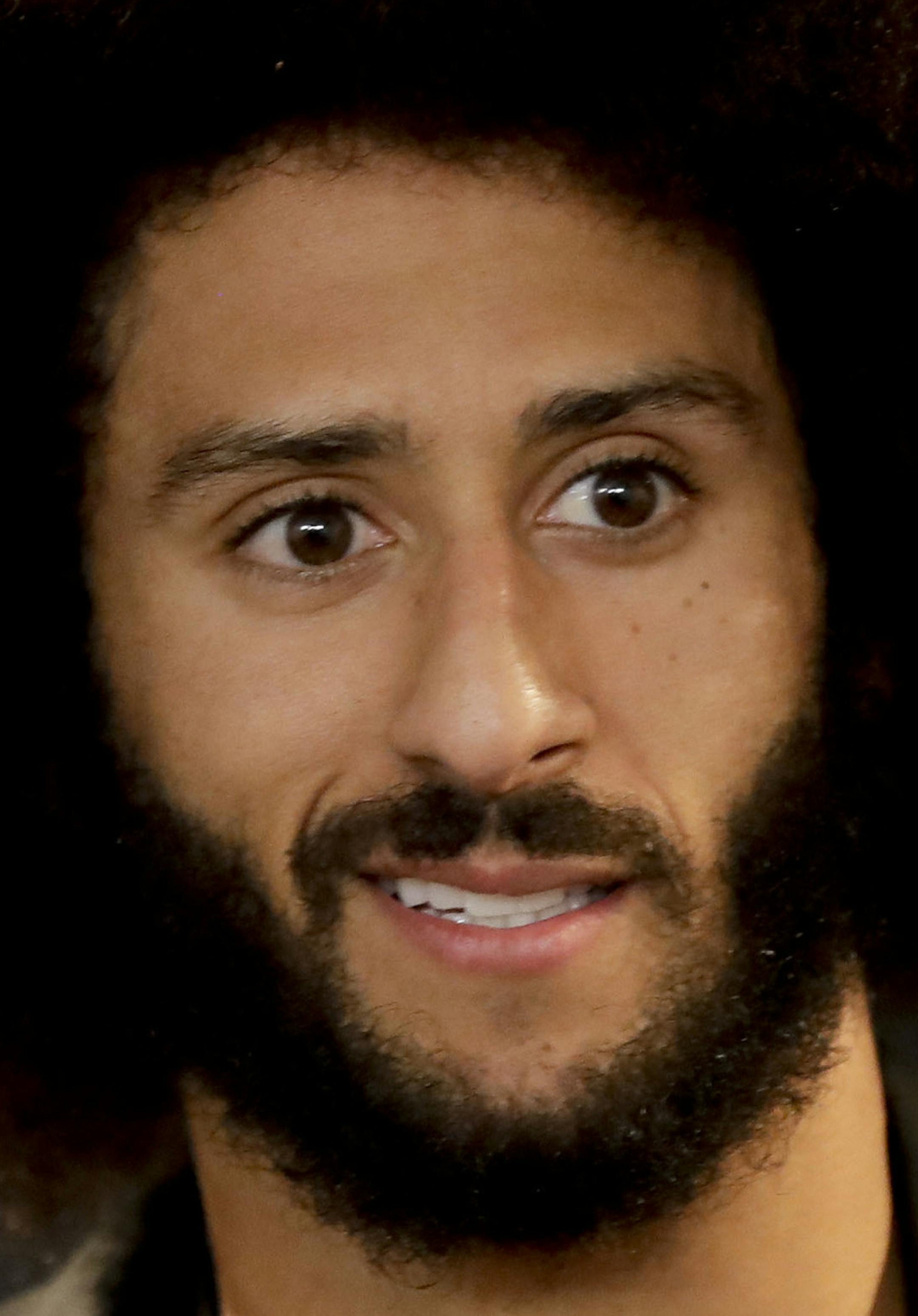 San Francisco 49ers quarterback Colin Kaepernick talks during a news conference after an NFL football game against the Los Angeles Rams Saturday, Dec. 24, 2016, in Los Angeles. The San Francisco 49ers won 22-21. (AP Photo/Rick Scuteri)
