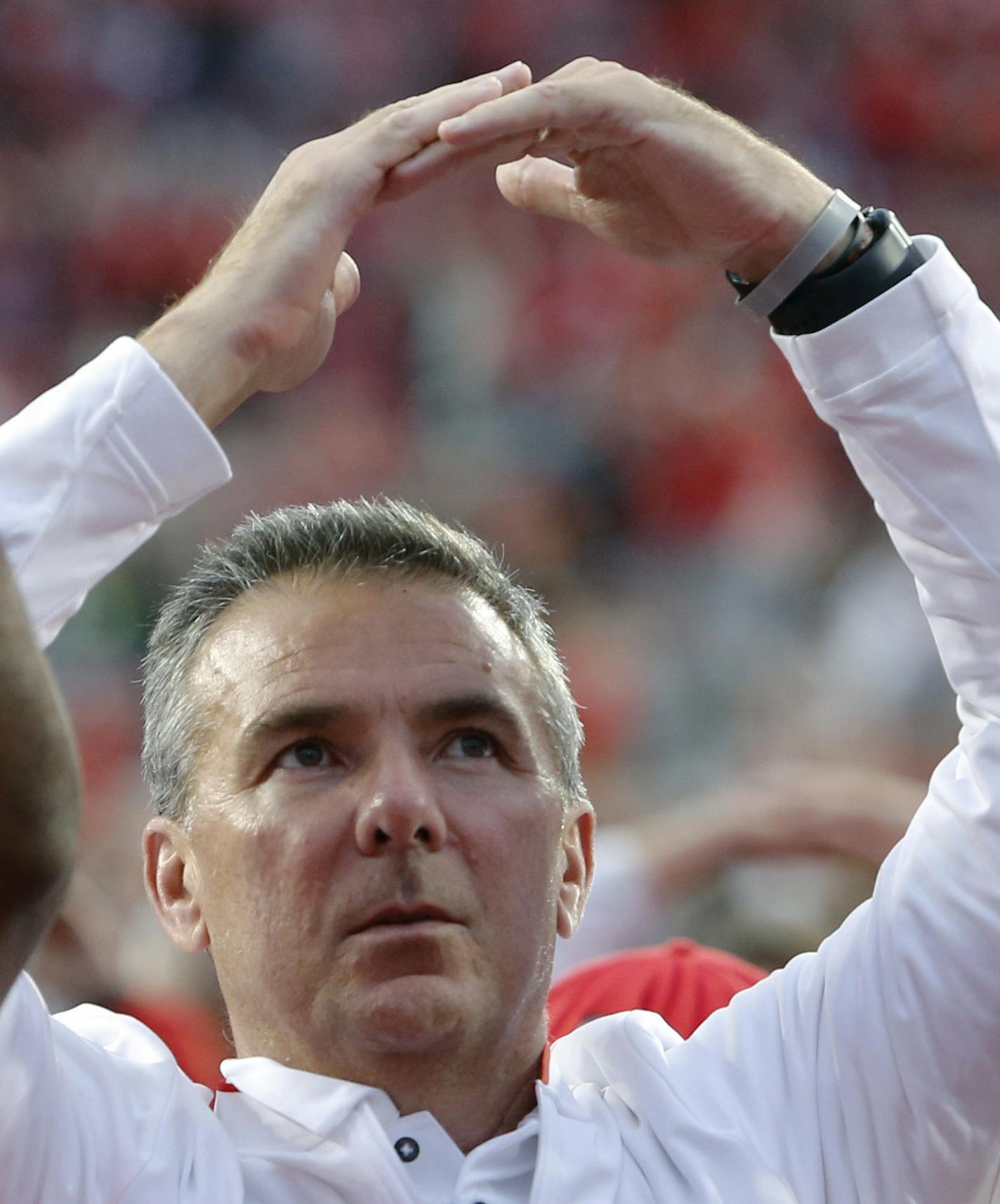 Ohio State head coach Urban Meyer sings the Ohio State alma mater after beating Tulane 49-6 in an NCAA college football game Saturday, Sept. 22, 2018, in Columbus, Ohio. (AP Photo/Jay LaPrete) ORG XMIT: OHJL123