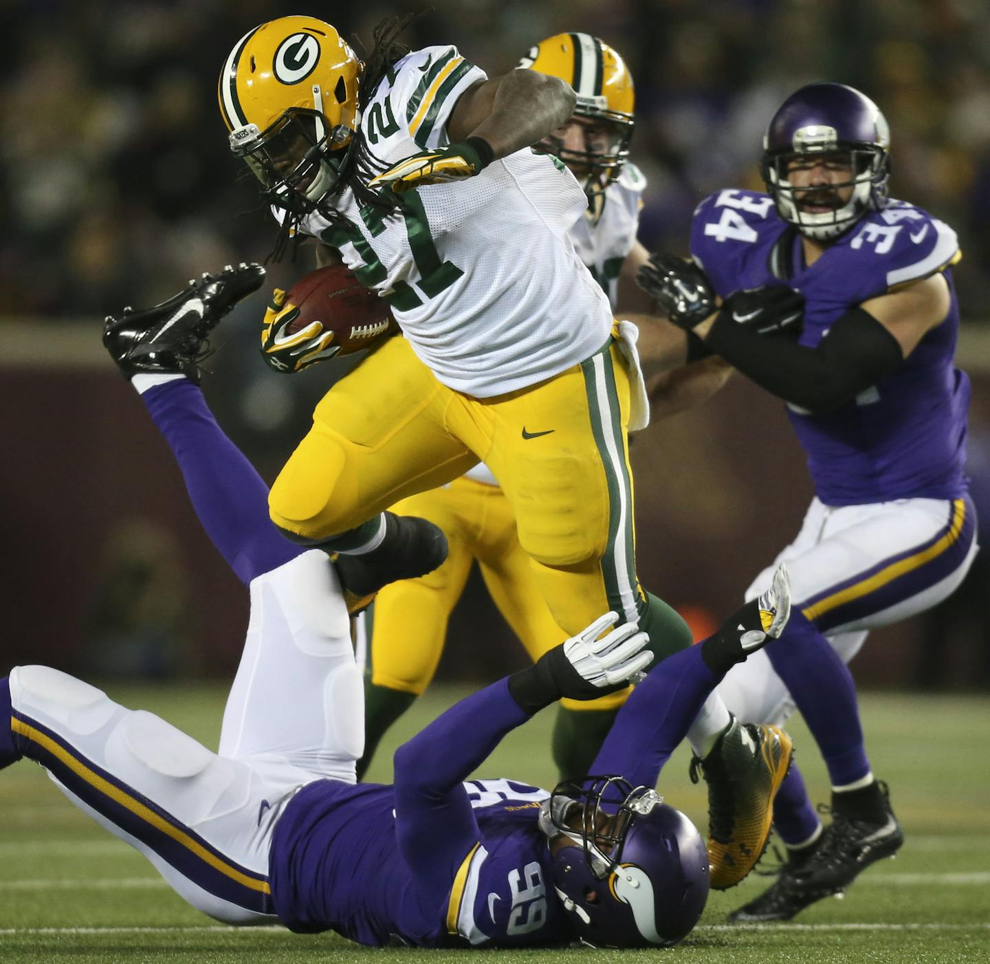 Green Bay Packers running back Eddie Lacy (27) bowled over Vikings defensive end Danielle Hunter (99) while losing two yards on the last play of the third quarter Sunday afternoon. ] JEFF WHEELER &#xef; jeff.wheeler@startribune.com The Minnesota Vikings lost to the Green Bay Packers 30-13 in an NFL football league game Sunday afternoon, November 22, 2015 at TCF Bank Stadium in Minneapolis.