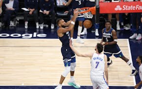 Wolves's Rudy Gobert dunks in the third quarter.