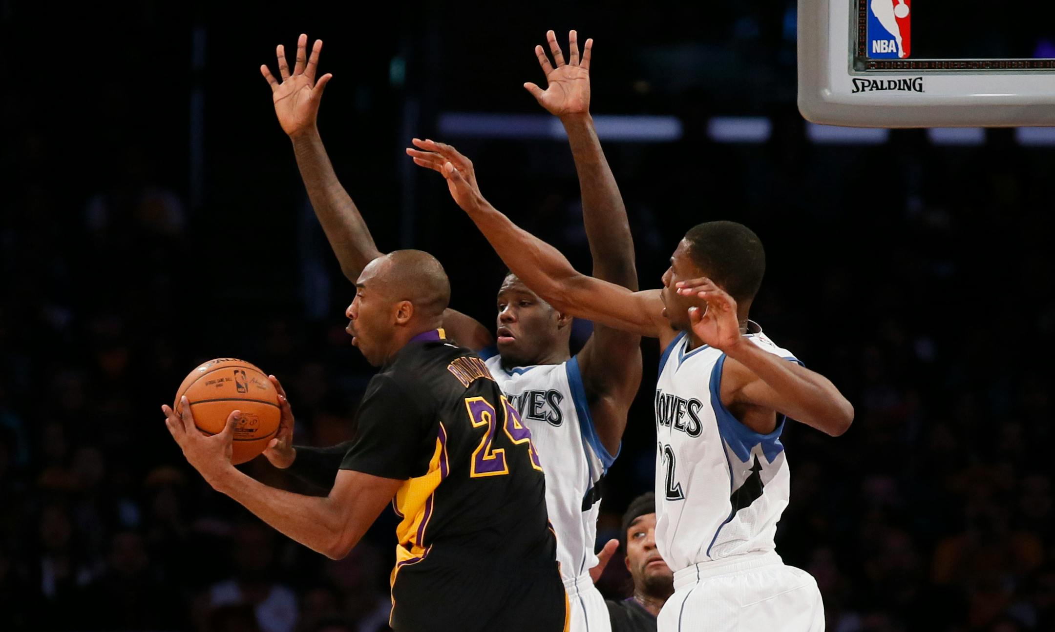 The Timberwolves' Anthony Bennett, center, and Andrew Wiggins, right, are shown against Kobe Bryant and the Lakers last season. Wiggins and Bennett will get to play two preseason games in their native Canada next fall.