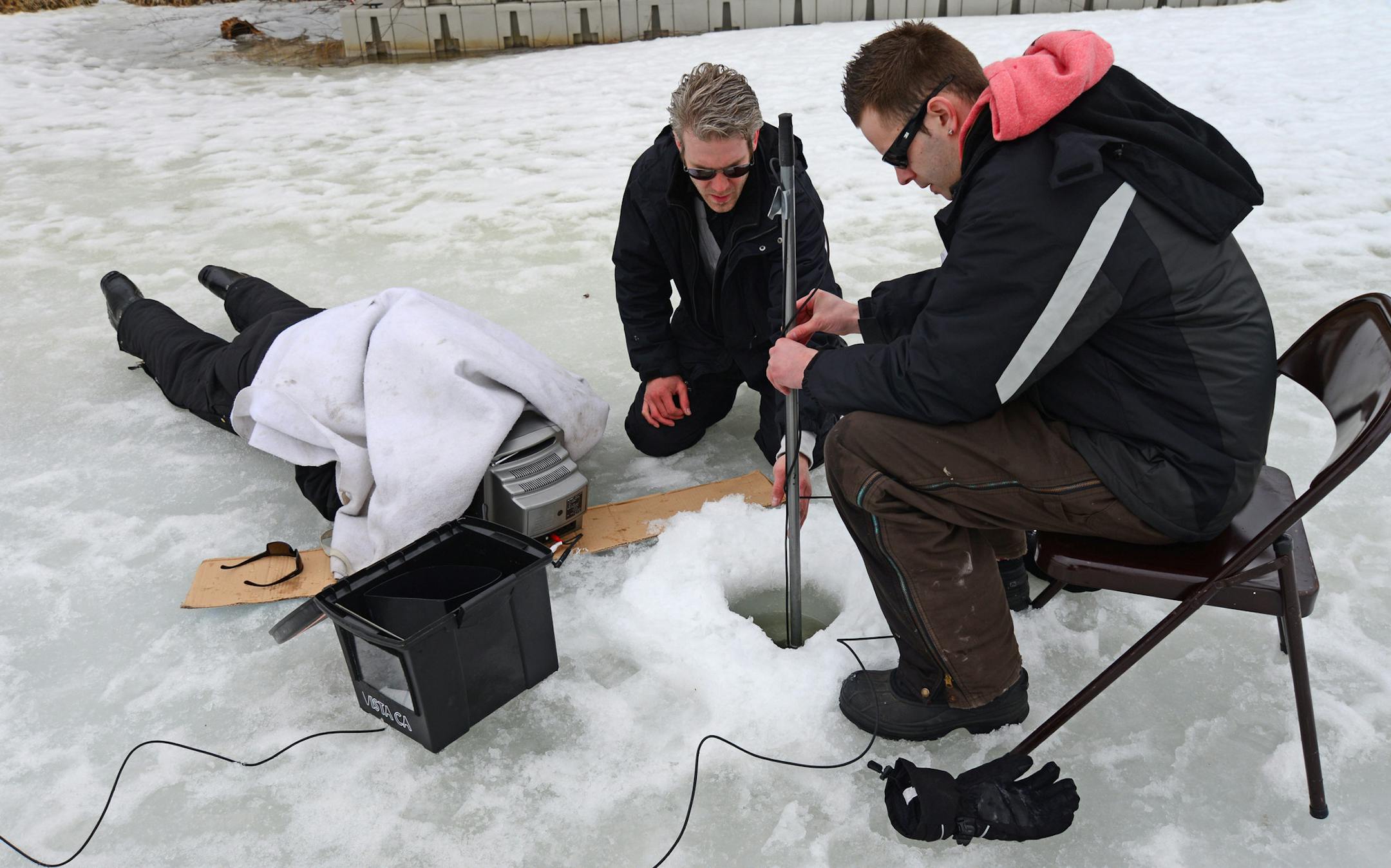 Kira Trevino's cousin, Mike Teige, is taking matters into his own hands. He showed up at Keller Lake Friday morning to do his own drilling and search. these volunteers used a underwater camera to look into one of hundreds of holes in the ice at Keller Lake] Richard.Sennott@startribune.com Richard Sennott/Star Tribune. , Maplewood Minn. Friday 3/29/13) ** (cq)