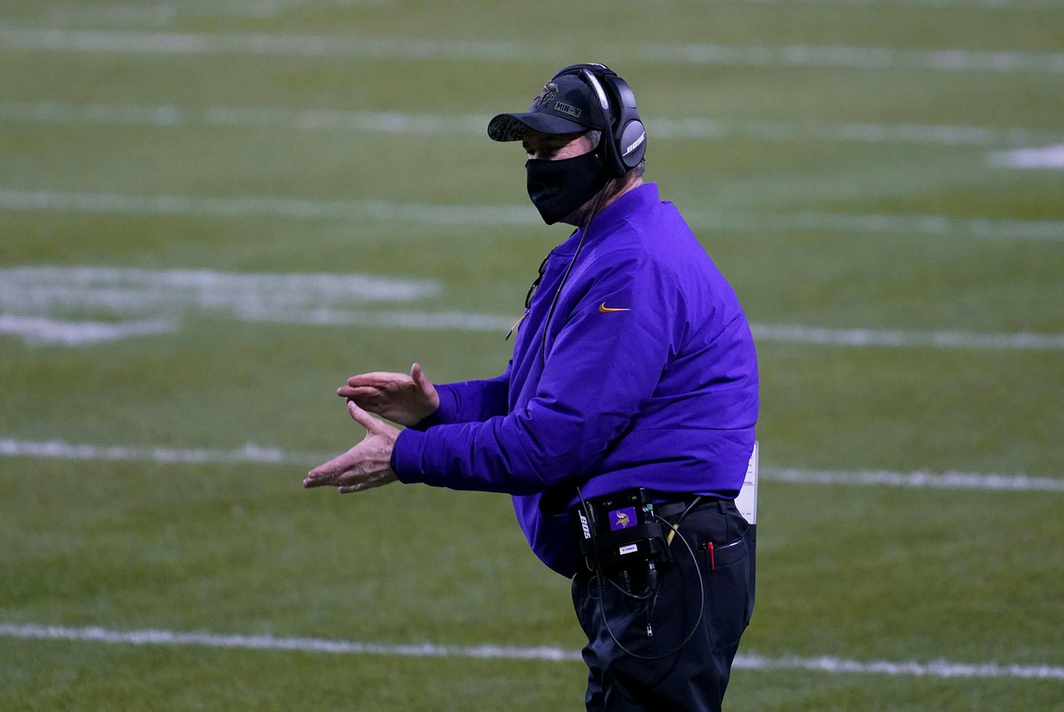 Minnesota Vikings head coach Mike Zimmer watches from the sidelines during the first half of an NFL football game against the Chicago Bears Monday, Nov. 16, 2020, in Chicago. (AP Photo/Charles Rex Arbogast)