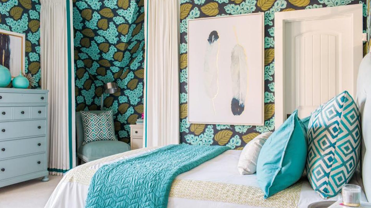 Vibrant blue and green floral wallpaper inside a bedroom from the HGTV Smart Home sweepstakes. Provided by HGTV