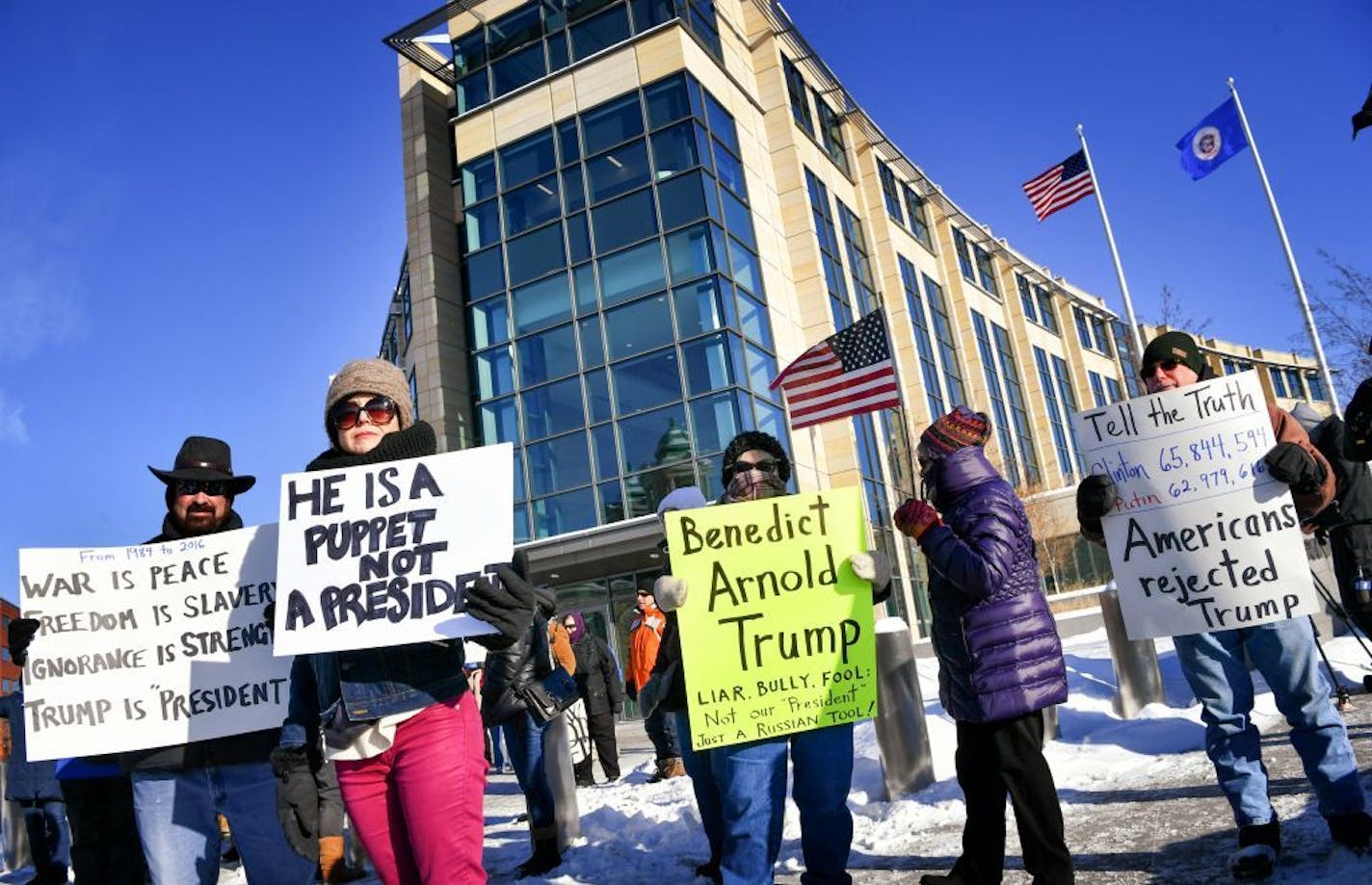 Protesters outside the Electoral College Assembly at the Senate Office Building.