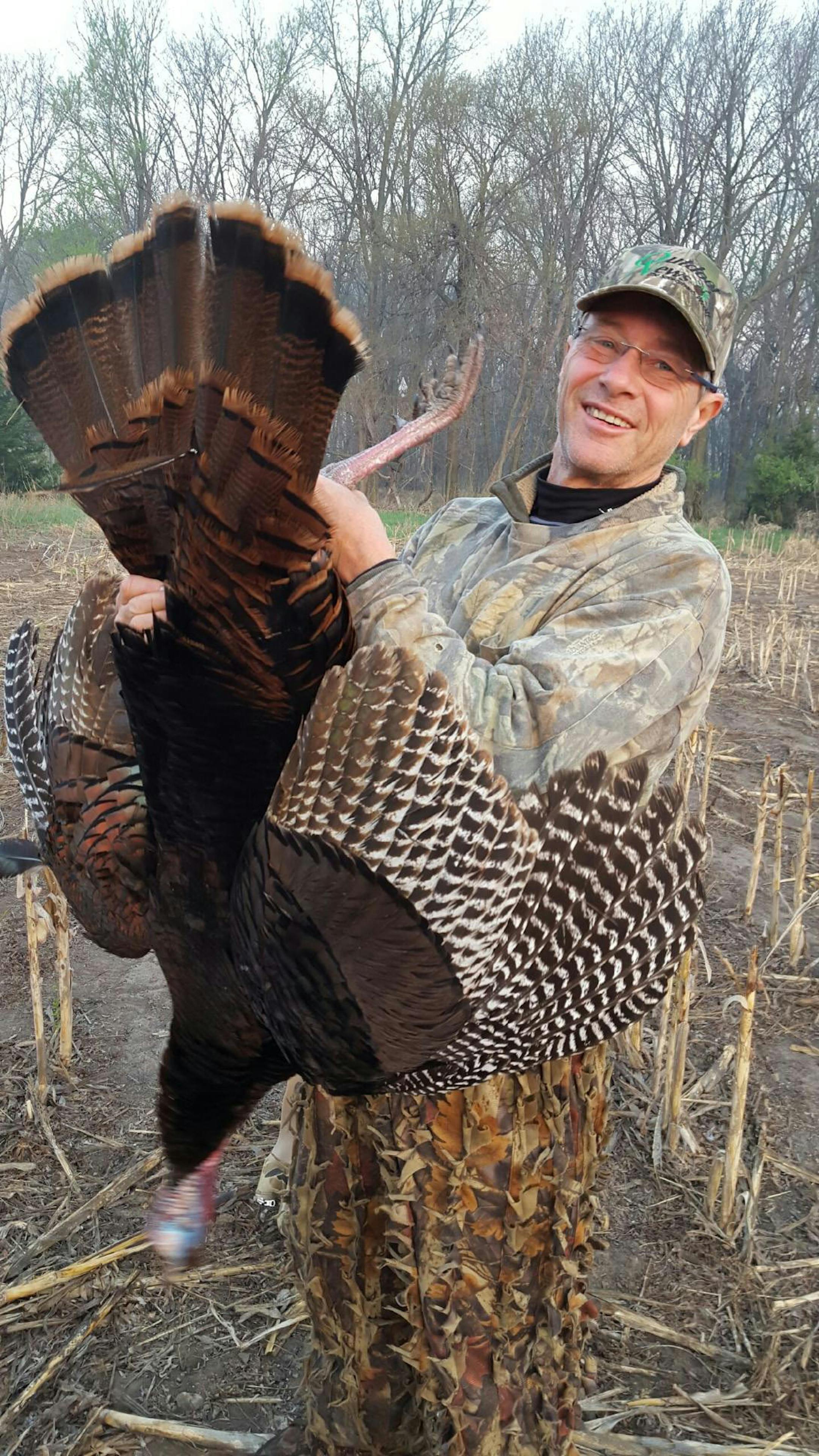 C.B. Bylander took a bird during a turkey hunt in Kansas (for Outdoors Weekend).