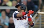 Twins designated hitter Nelson Cruz follows through on a single in the first inning of a spring training game Feb. 29