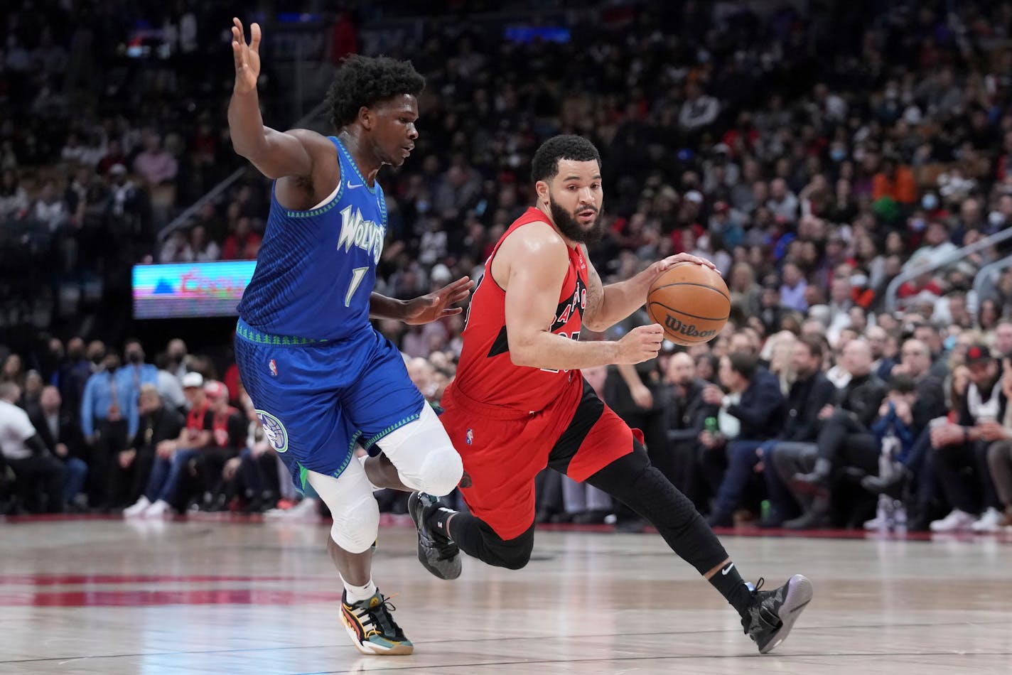 Toronto guard Fred VanVleet drives past Timberwolves forward Anthony Edwards during the first half Wednesday.