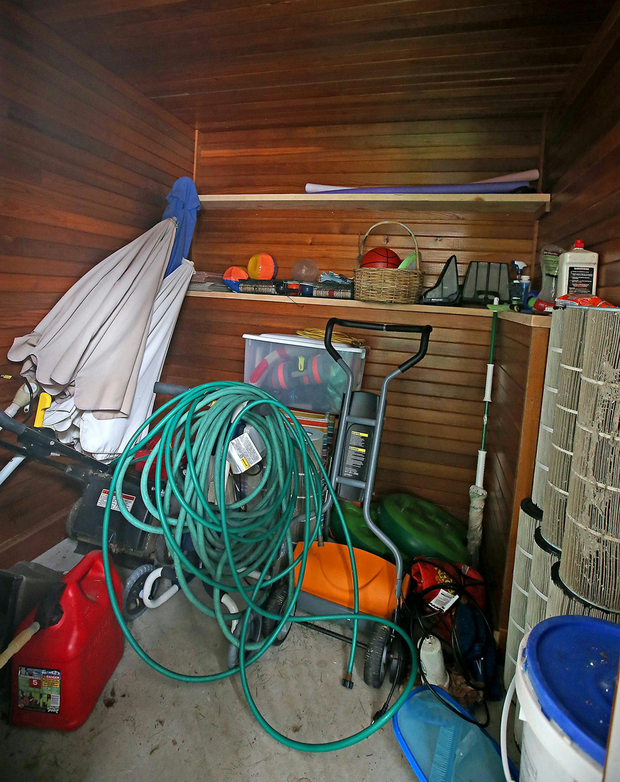 This storage area was finished with cedar paneling removed from the three-season porch.