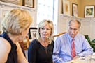 Gretchen Carlson, center, with her attorneys Martin Hyman, right, and Nancy Erika Smith at Smith&#xed;s home in Montclair, N.J., July 12, 2016. In a f