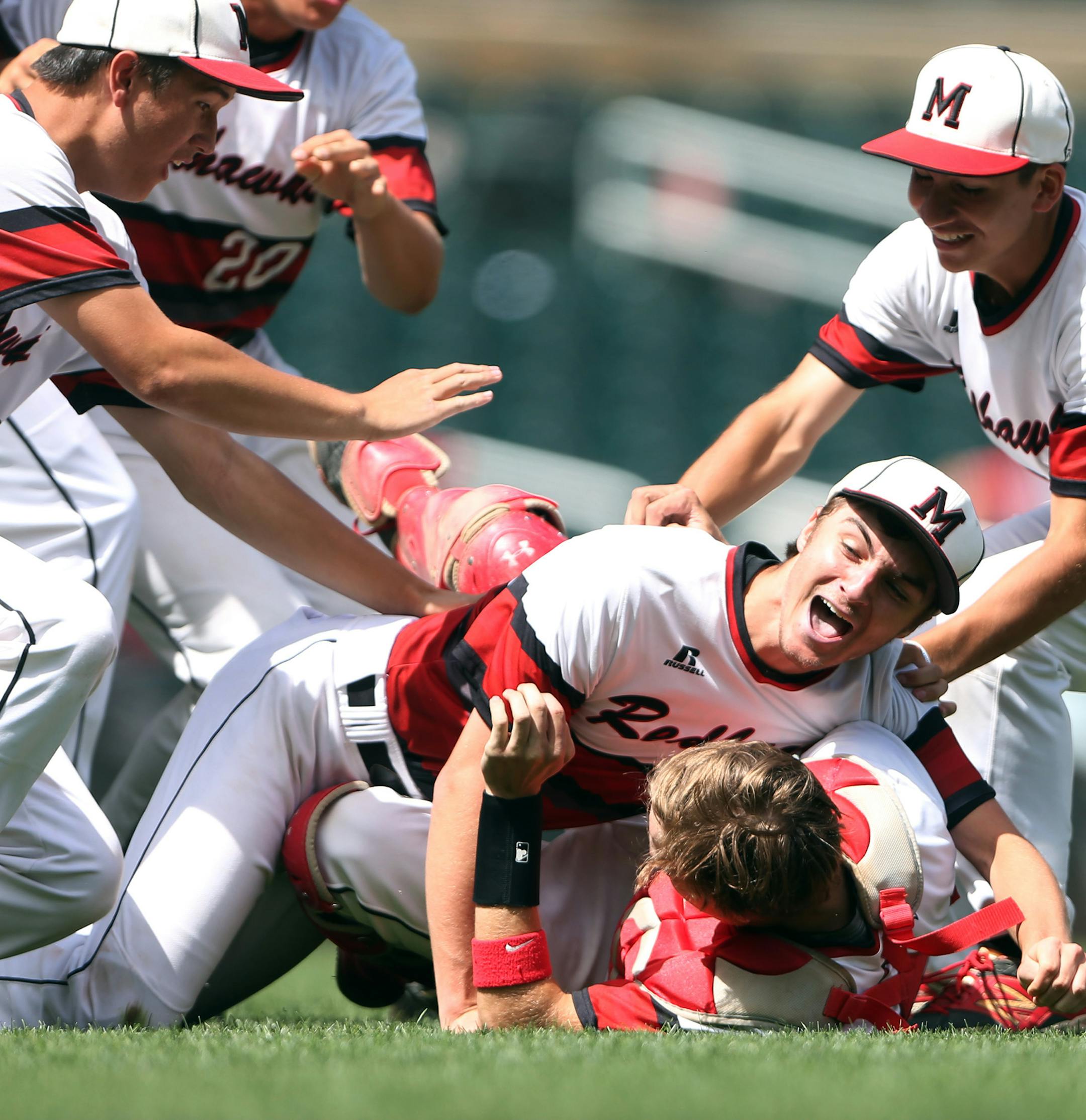 Minnehaha pitcher Jesse Retzlaff (center),celebrated their win over Belle Plaine with catcher Justin Evenson at Target Field Monday June 20, 2016 in Minneapolis, MN.] Minnehaha Academy beat Belle Plaine 5-1 in the class 2A championship game at Target Field. Jerry Holt /Jerry.Holt@Startribune.com