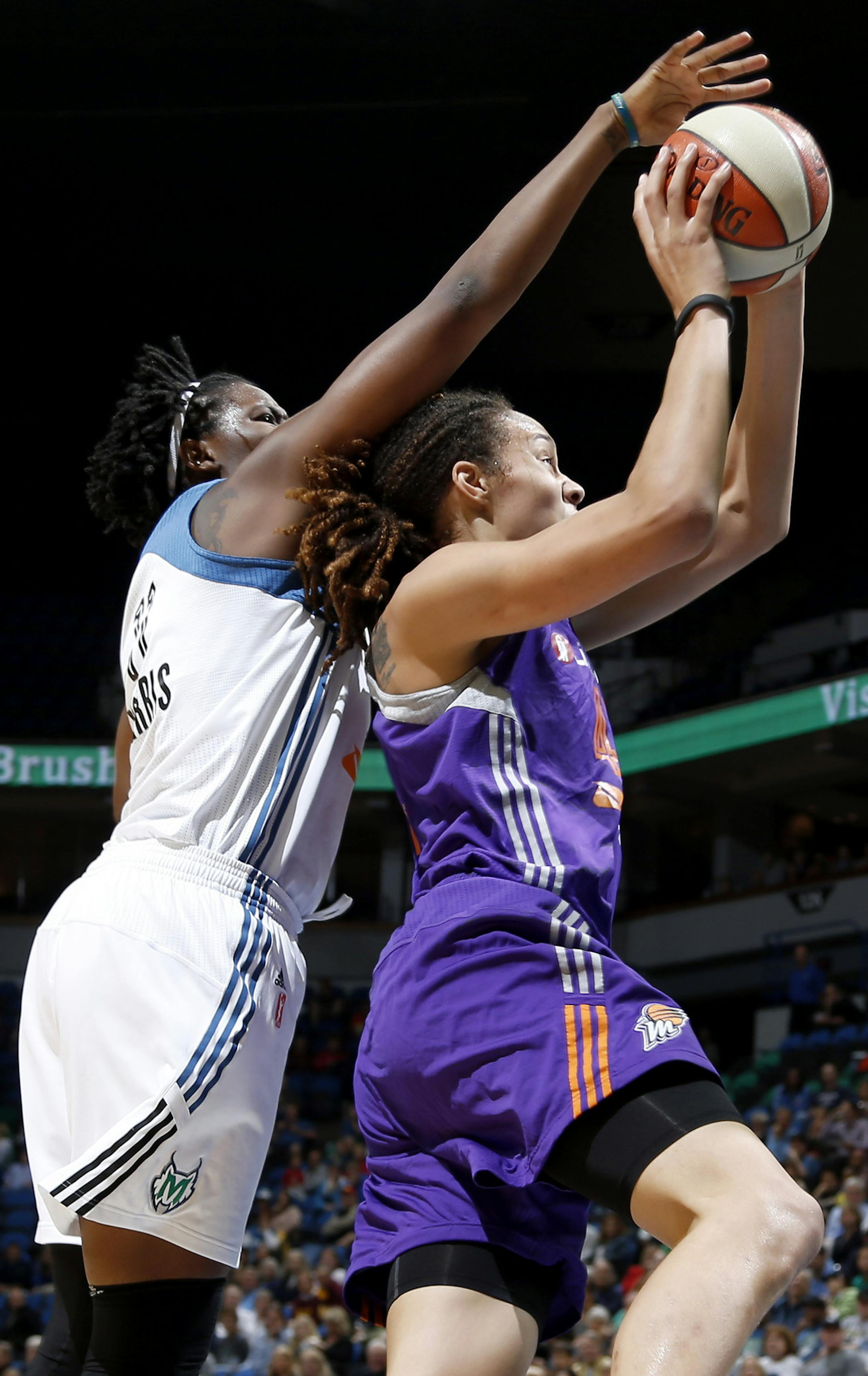 Amber Harris (11) blocked a shot by Brittney Griner (42) in the first quarter forcing a jump ball. ] CARLOS GONZALEZ cgonzalez@startribune.com June 5, 2013, Minneapolis, Minn., Target Center, WNBA, Minnesota Lynx vs. Phoenix Mercury