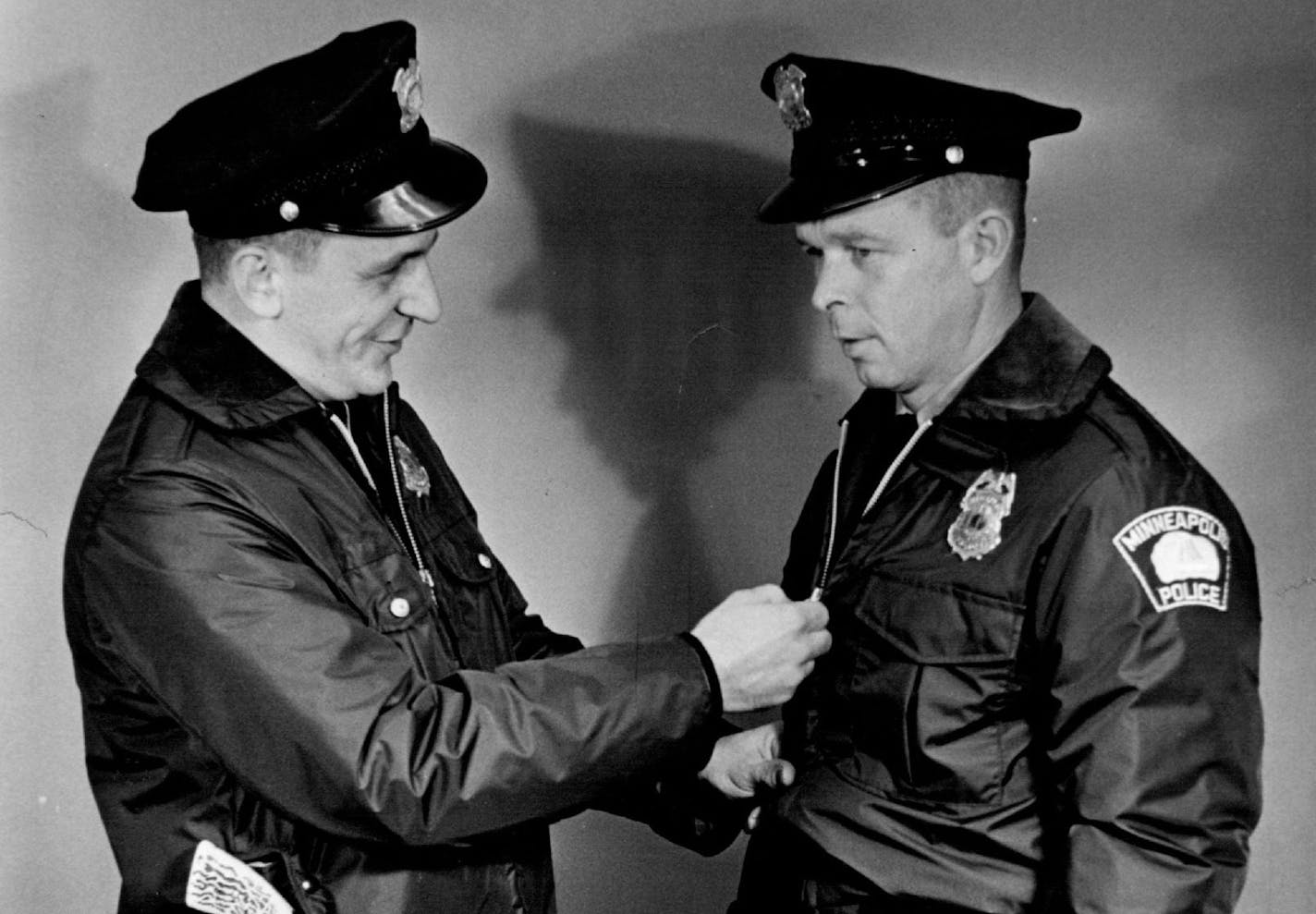 Patrolman Richard A. Kroger and Patrolman Donald M. Hallberg showed the new winter uniforms in October 1963.