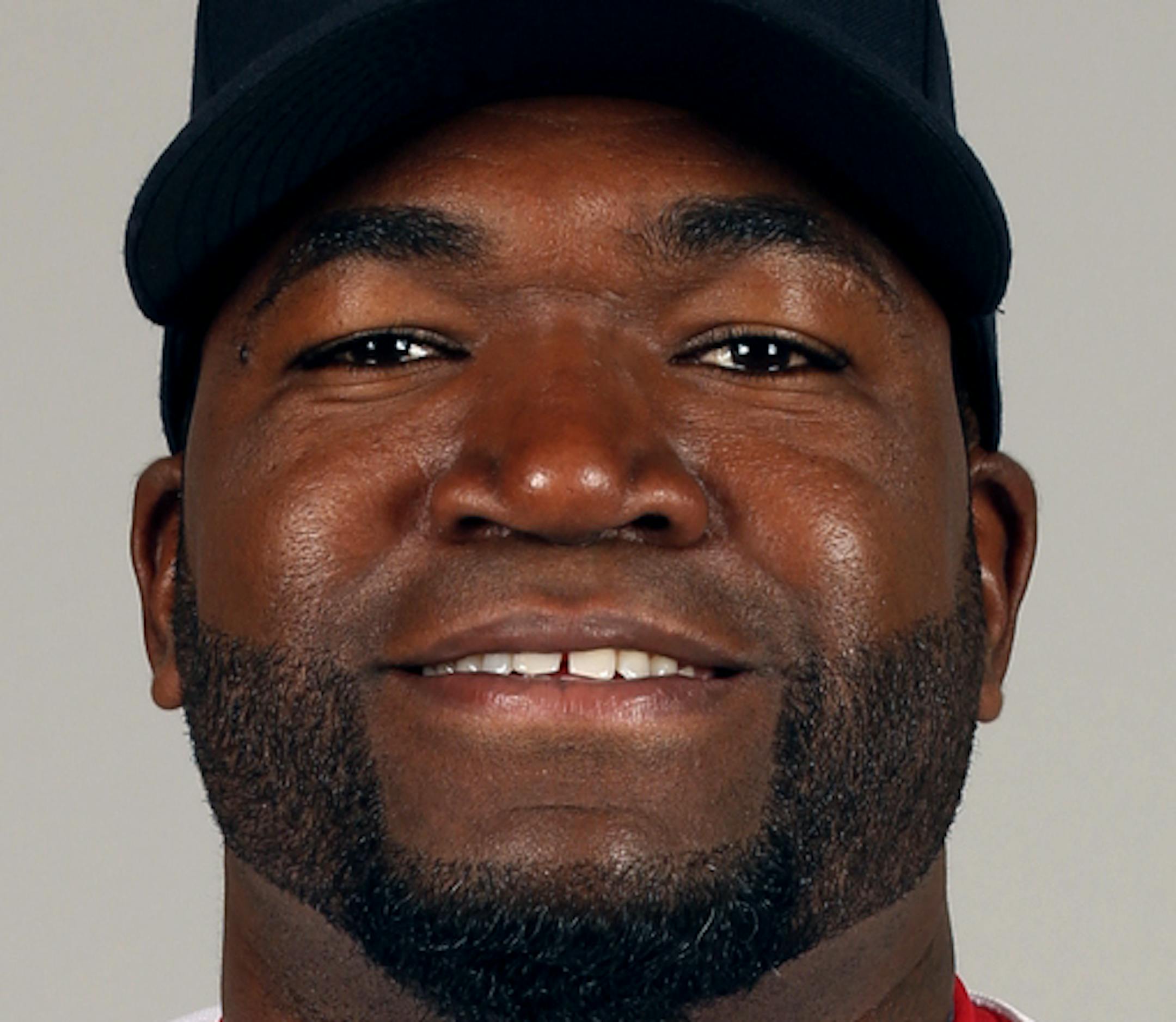 FORT MYERS, FL - FEBRUARY 17: David Ortiz #34 of the Boston Red Sox poses during Photo Day on Sunday, February 17, 2013 at JetBlue Park in Fort Myers, Florida. (Photo by Robert Rogers/MLB Photos via Getty Images) *** Local Caption *** David Ortiz ORG XMIT: 159447663