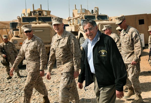 Defense Secretary Leon Panetta visits troops at Forward Operating Base Shukvani, Afghanistan, Wednesday.