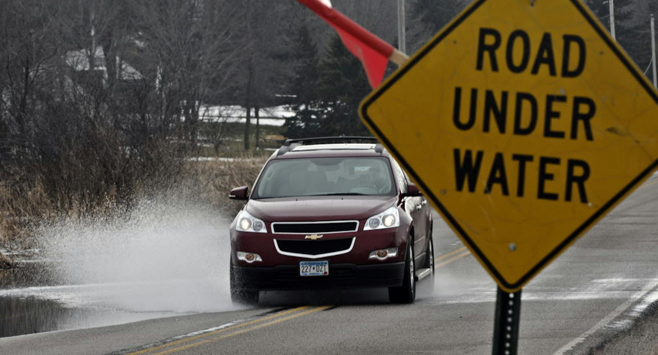Water is running across Tamarac Drive in Medina.