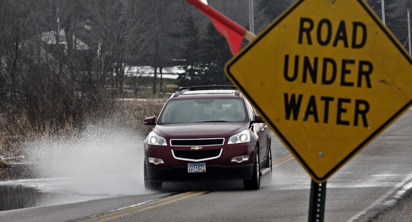 Water is running across Tamarac Drive in Medina.