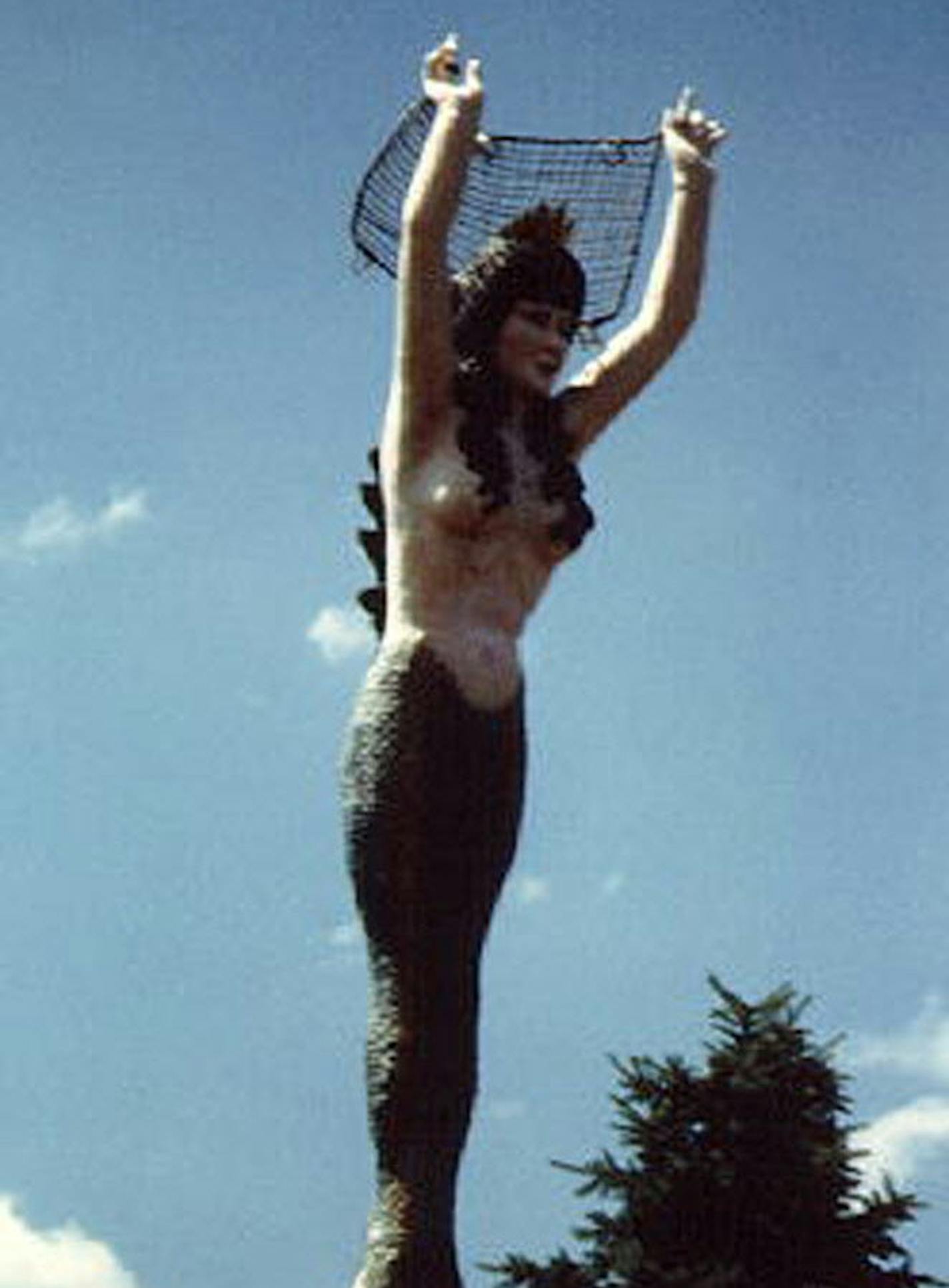 the Mermaid statue atop the establishment of the same n ame in Mounds View