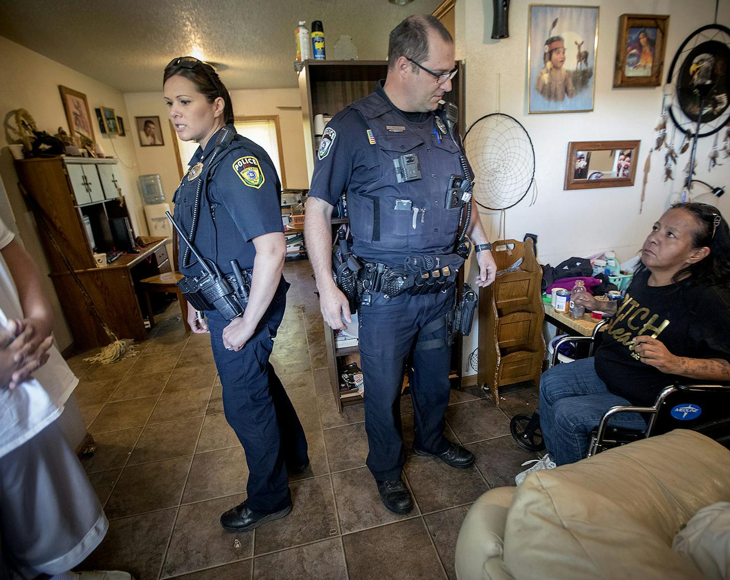 Mille Lacs Band of Ojibwe Interim Police Chief Sara Rice, left, and officer Noah Melberg made a welfare check on a home on the reservation, Thursday, September 28, 2017. ] ELIZABETH FLORES &#xef; liz.flores@startribune.com