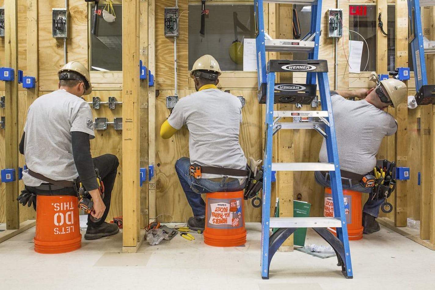 This photo provided by The Home Depot shows students training at the The Home Depot Foundation and HBI's Ft. Stewart Program on a job site in Ft. Stewart, Ga. The Home Depot Foundation announced last year that it was committing $50 million to skilled trades training with plans to attract 20,000 people by 2028.