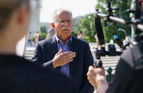 Illinois government worker Mark Janus talks during an interview before walking into the Supreme Court Building on Capitol Hill in Washington, Tuesday,
