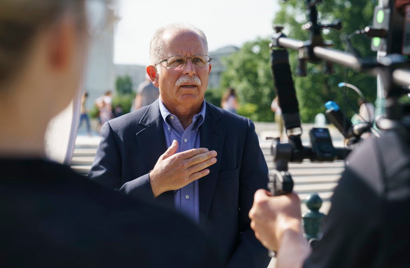 Illinois government worker Mark Janus talks during an interview before walking into the Supreme Court Building on Capitol Hill in Washington, Tuesday, June 26, 2018.