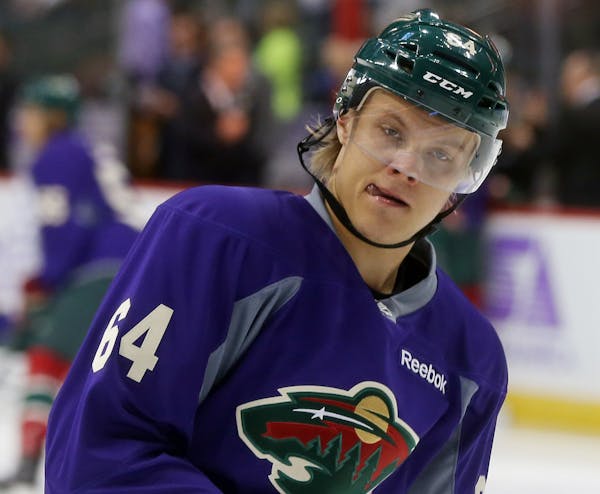 Minnesota Wild center Mikael Granlund of Finland warms up prior to an NHL hockey game against the Arizona Coyotes, Thursday, Oct. 23, 2014, in St. Pau