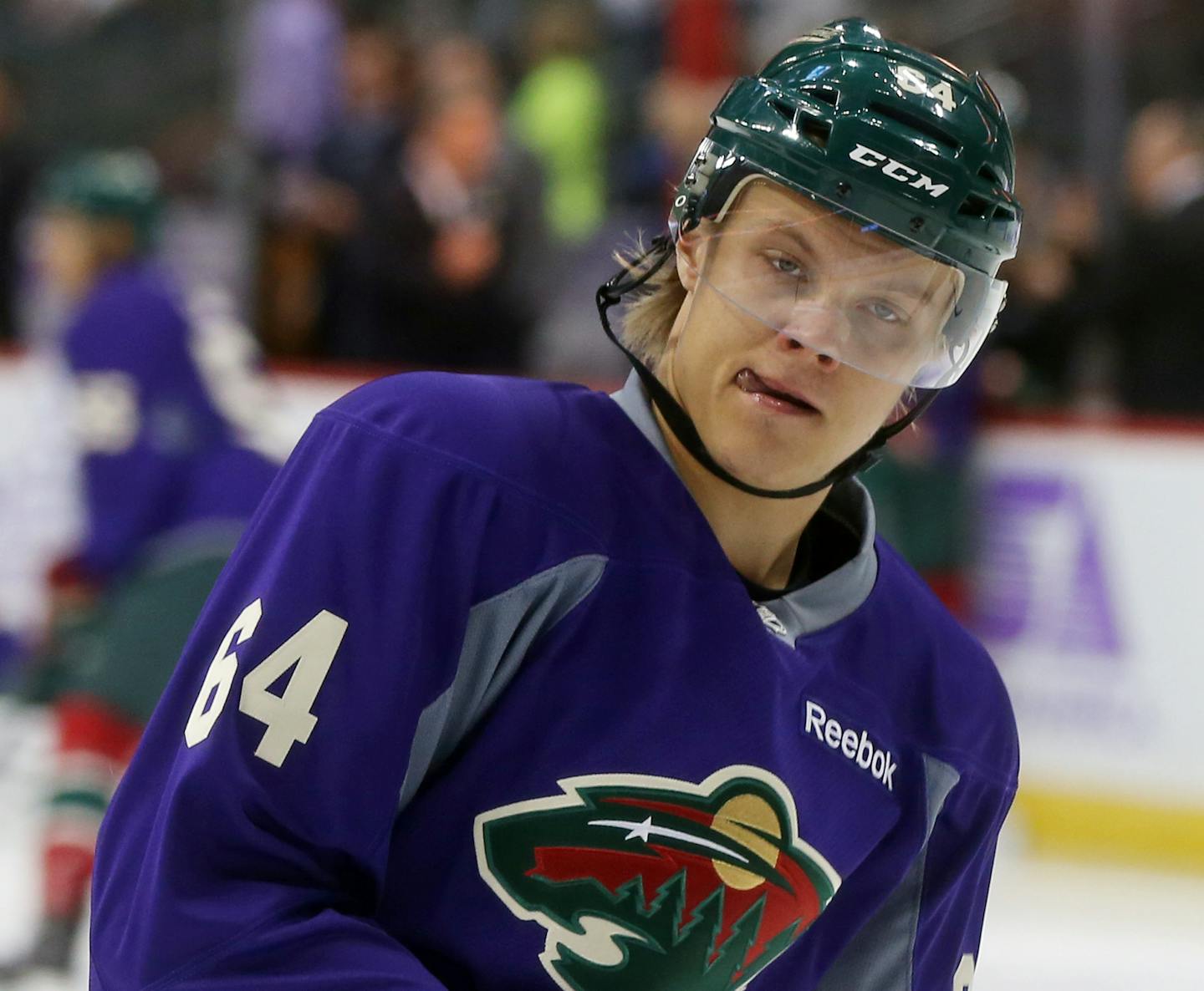 Minnesota Wild center Mikael Granlund of Finland warms up prior to an NHL hockey game against the Arizona Coyotes, Thursday, Oct. 23, 2014, in St. Paul, Minn. (AP Photo/Jim Mone) ORG XMIT: MNJM10