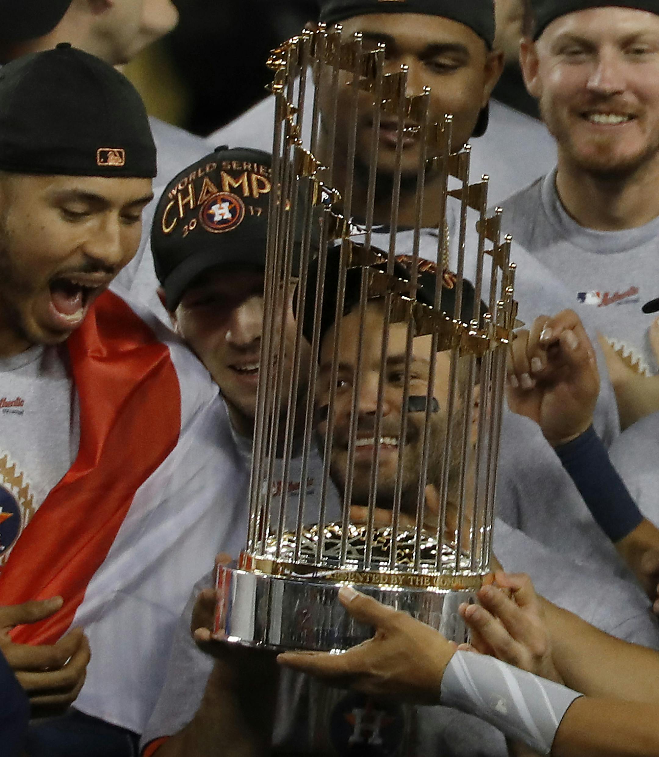 The Houston Astros celebrate after a 5-1 win against the Los Angeles Dodgers in Game 7 of the World Series at Dodger Stadium in Los Angeles on Wednesday, Nov. 1, 2017. (Luis Sinco/Los Angeles Times/TNS)