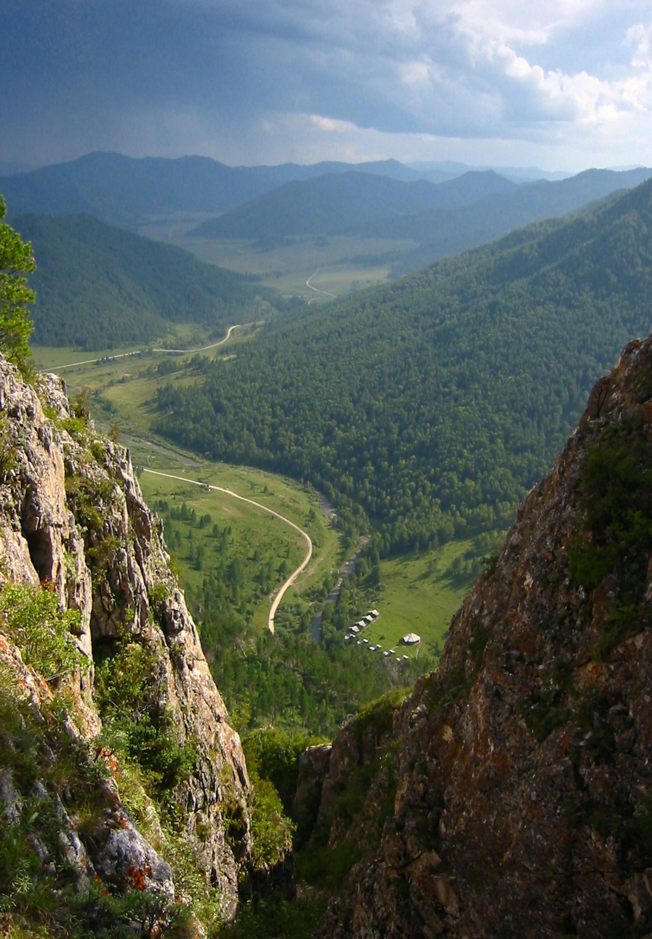 In a photo provided by Bence Viola, a view from above the Denosova Cave archaeological site in Siberia, where bones from an unknown group of prehistoric humans were found in 2010. The discovery of a Neanderthal-Denisovan hybrid among the bones here points to the prehistoric world as home to a marvelous range of human diversity. (Bence Viola, Max Planck Institute for Evolutionary Anthropology via The New York Times) -- NO SALES; FOR EDITORIAL USE ONLY WITH HYBRID HUMANS BY ZIMMER FOR AUG. 23. 201