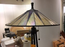 Two Tiffany-style art-glass lamps that used to frame the entrance to the men's FYI department are $100 each.