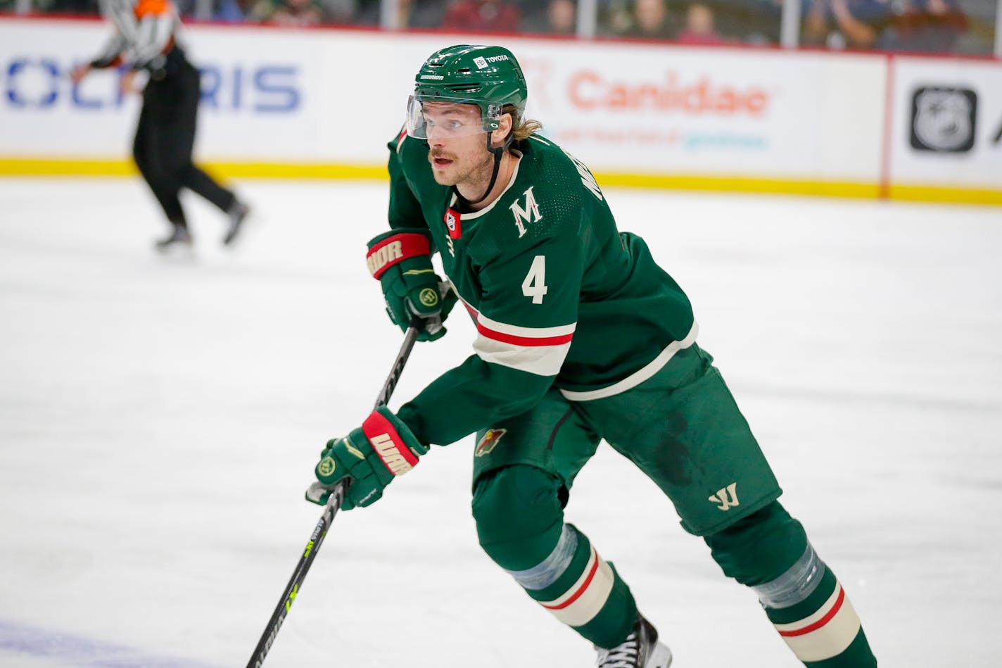 Minnesota Wild defenseman Jon Merrill plays during an NHL hockey game against the Nashville Predators, Sunday, Oct. 24, 2021, in St. Paul, Minn. (AP Photo/Andy Clayton-King)