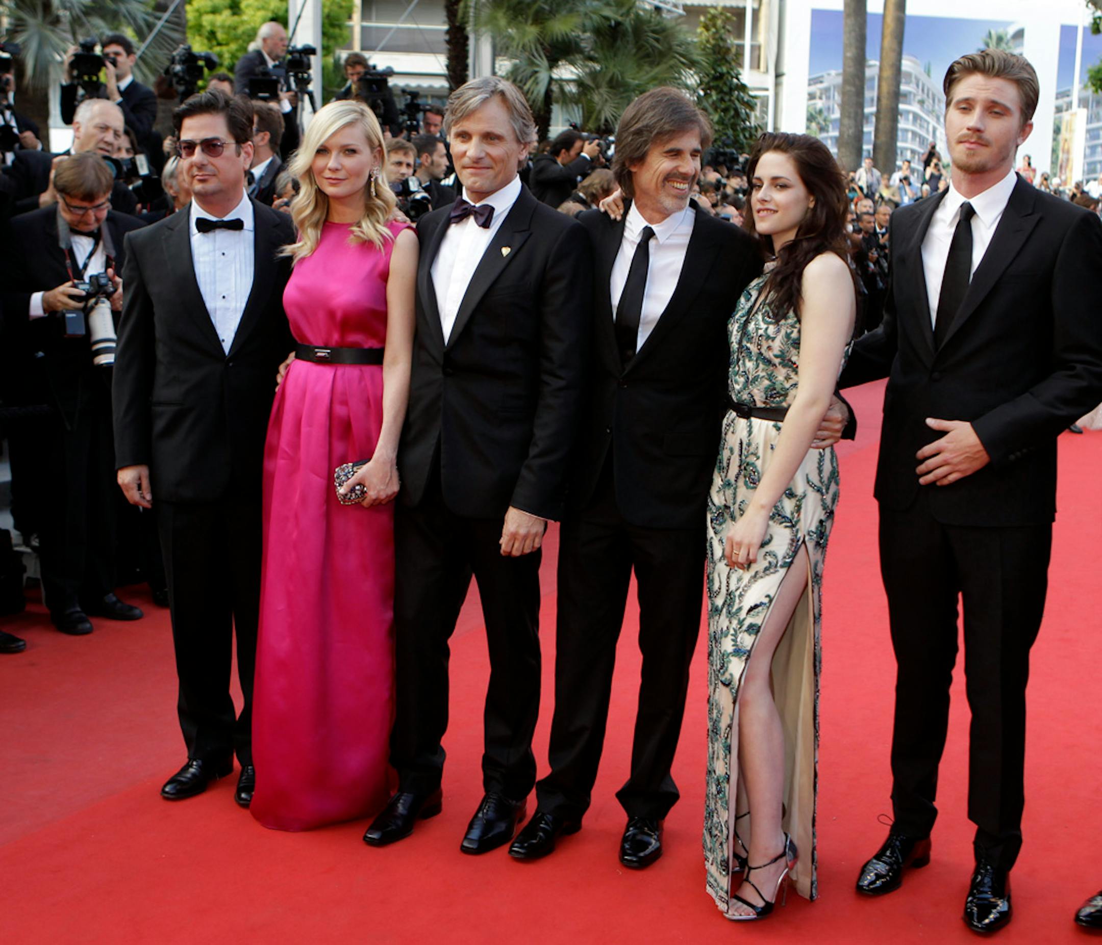 From left, producer Roman Coppola, actors Kirsten Dunst, Viggo Mortensen, director Walter Salles, actors Kristen Stewart Garret Hedlund arrives for the screening of "On the Road" at the 65th international film festival, in Cannes, southern France.