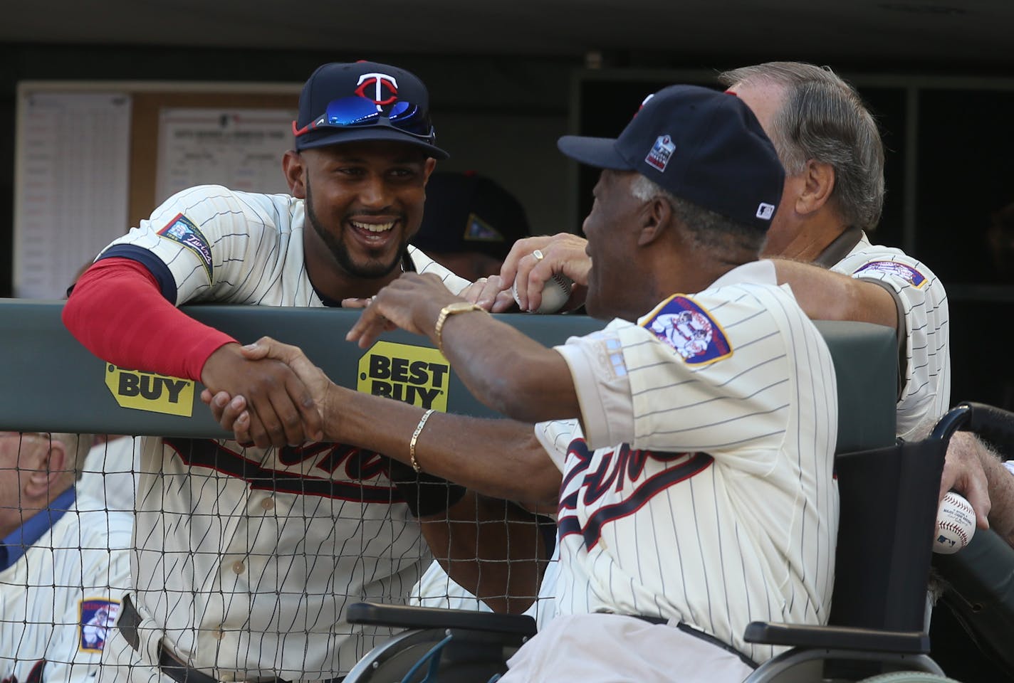 Twin Aaron Hicks came over to say hi to former Twin Jim "Mudcat" Grant before the 1965 team was honored. ] (KYNDELL HARKNESS/STAR TRIBUNE) kyndell.harkness@startribune.com Mariners vs Twins at Target Field in Minneapolis, Min., Saturday August 1, 2015.